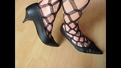 black leather pumps and fishnet hose, Isabelle-Sandrine presents her newest style Thumb