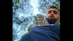 Big uncut cock latino jerking outdoors in the woods and eating his tasty cum careful not to get caug Thumb